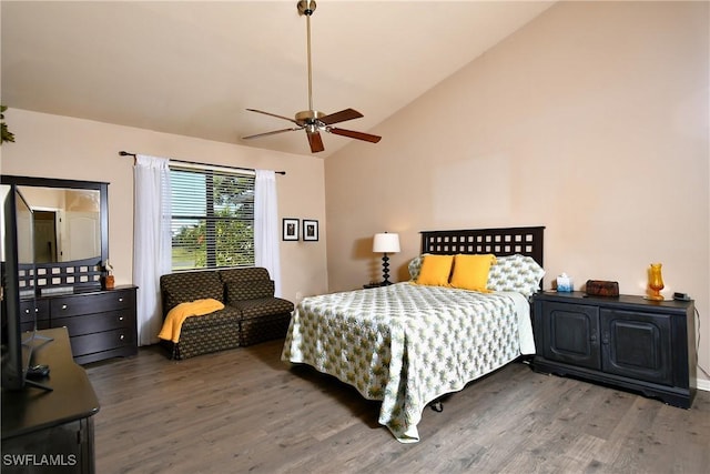 bedroom featuring wood finished floors, a ceiling fan, and vaulted ceiling