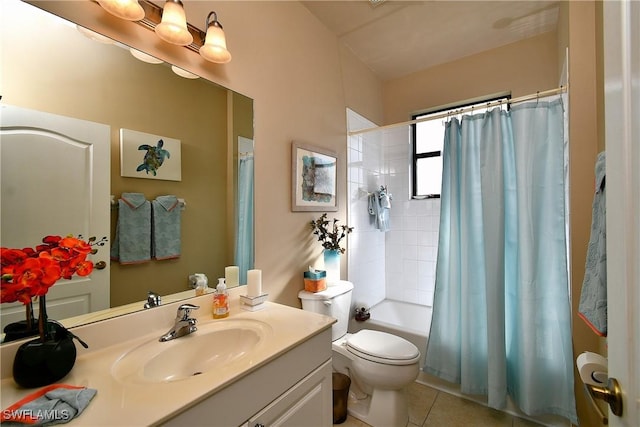 bathroom featuring tile patterned floors, toilet, vanity, and shower / bath combination with curtain