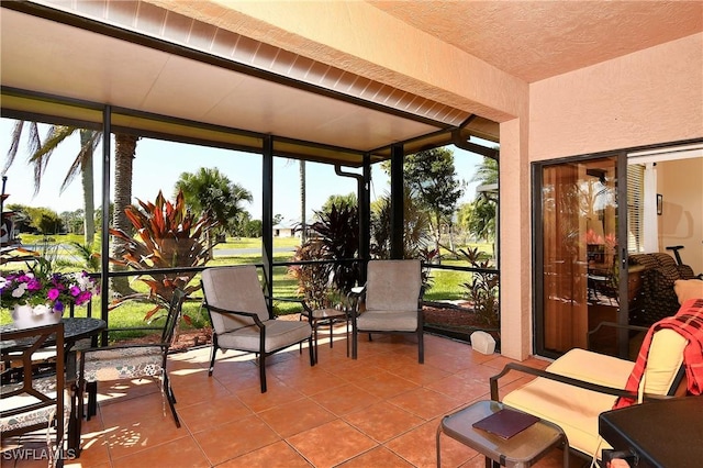 sunroom with plenty of natural light