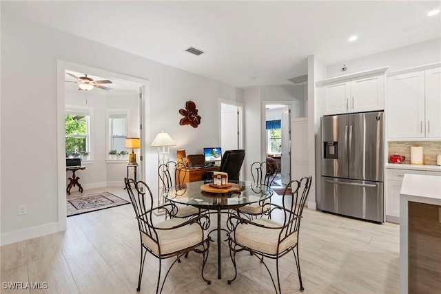 dining room with visible vents, baseboards, light wood-type flooring, recessed lighting, and a ceiling fan