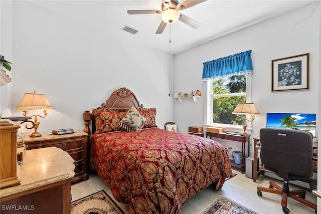 bedroom featuring visible vents and a ceiling fan