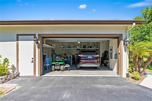 garage with driveway