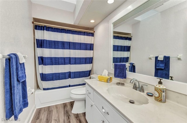 full bath featuring vanity, shower / bathtub combination with curtain, toilet, and wood finished floors