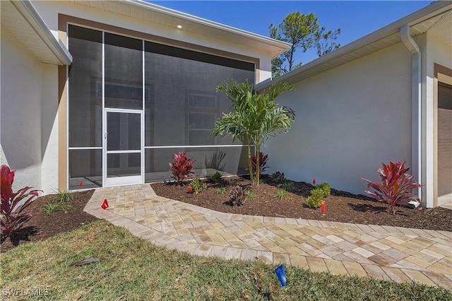 exterior space with stucco siding