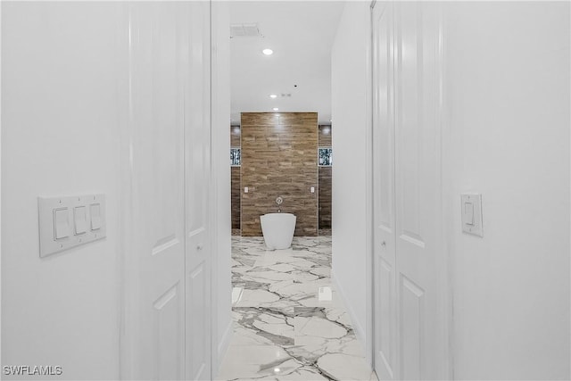 bathroom with recessed lighting, visible vents, marble finish floor, and a closet