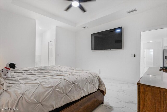 bedroom with visible vents, marble finish floor, and ceiling fan