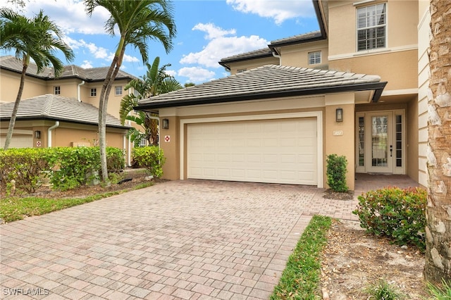 exterior space with decorative driveway