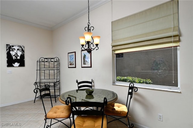 dining area with light tile patterned flooring, a notable chandelier, crown molding, and baseboards