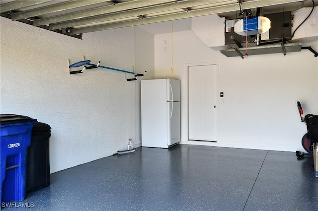 garage featuring freestanding refrigerator