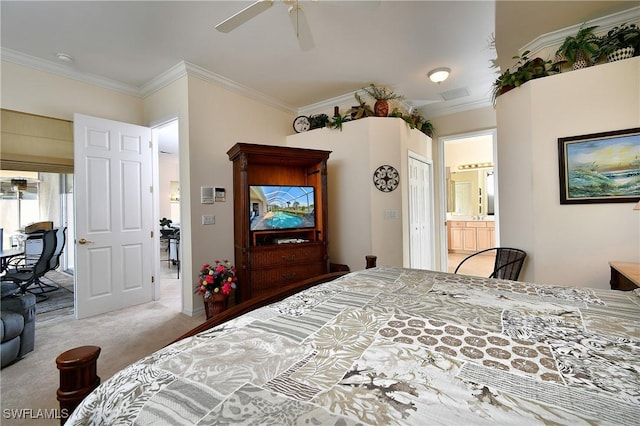 carpeted bedroom featuring ceiling fan, connected bathroom, and ornamental molding