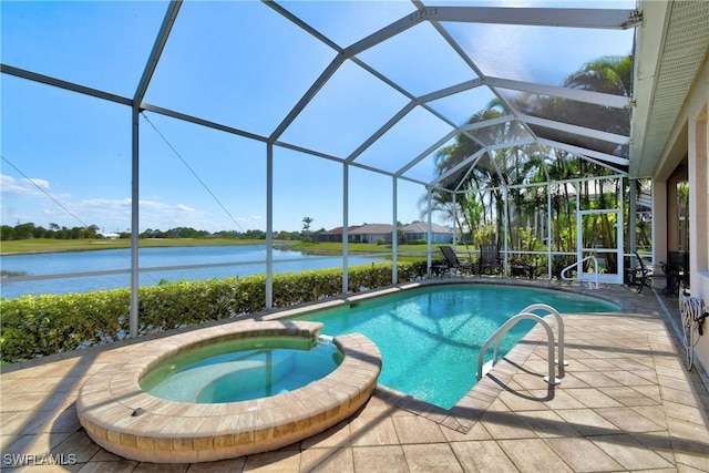 view of pool featuring a patio area, a water view, glass enclosure, and a pool with connected hot tub