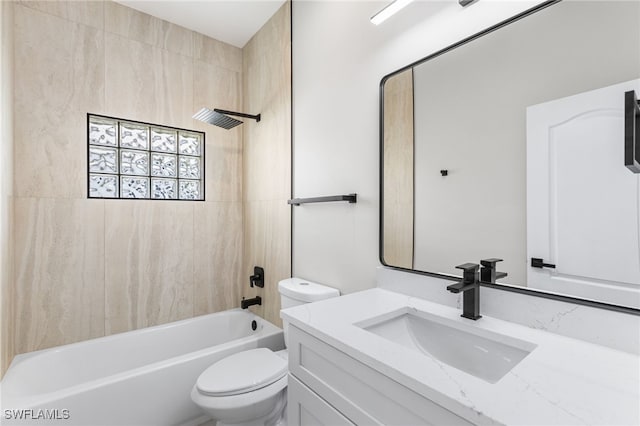 bathroom featuring toilet, washtub / shower combination, and vanity