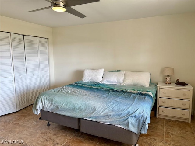 bedroom with a closet and ceiling fan