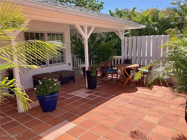 view of patio with fence