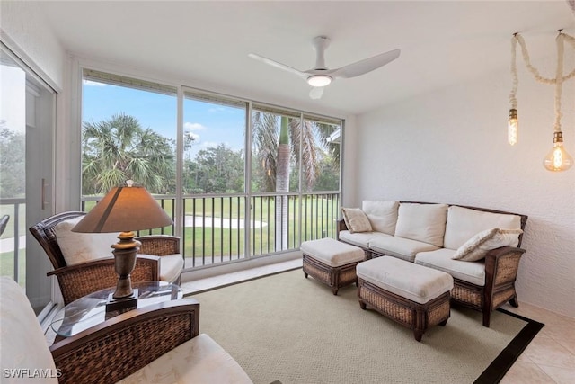 sunroom with ceiling fan