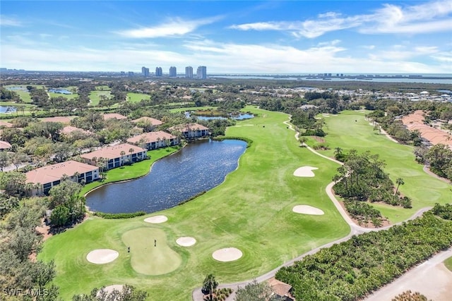 drone / aerial view featuring a water view and view of golf course