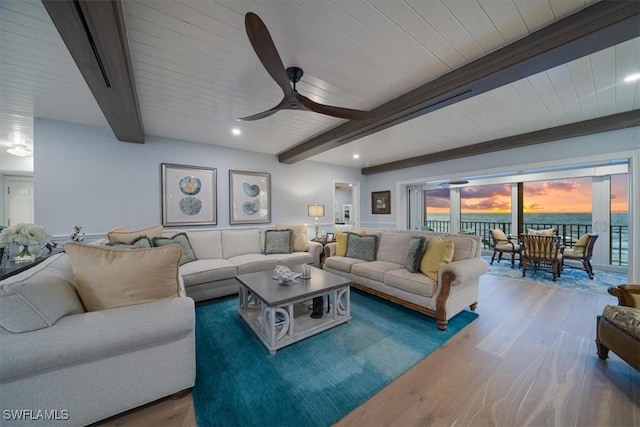 living room featuring beam ceiling, recessed lighting, wood finished floors, and ceiling fan