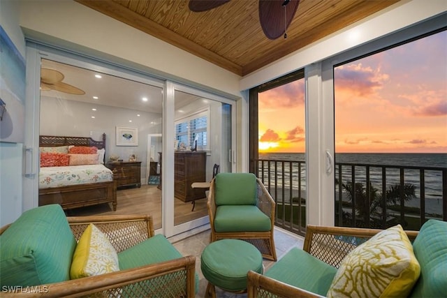 interior space featuring wooden ceiling and ceiling fan