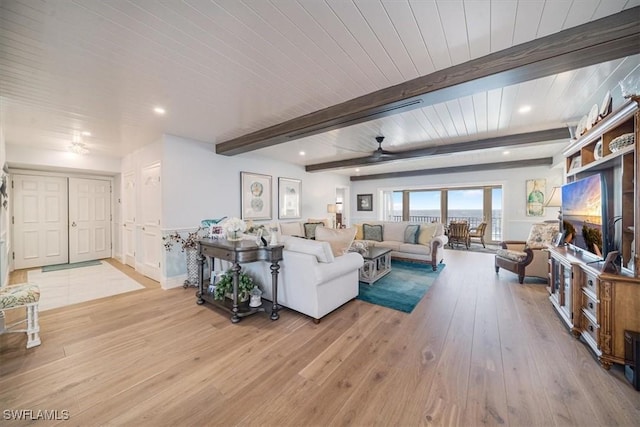 living room with recessed lighting, beamed ceiling, light wood-style flooring, and a ceiling fan