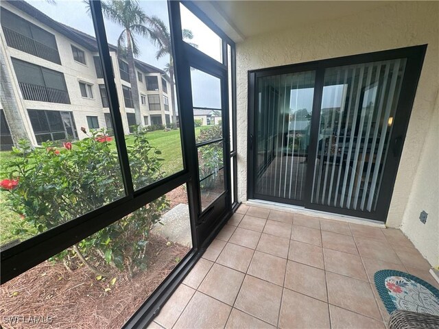 unfurnished sunroom featuring a healthy amount of sunlight