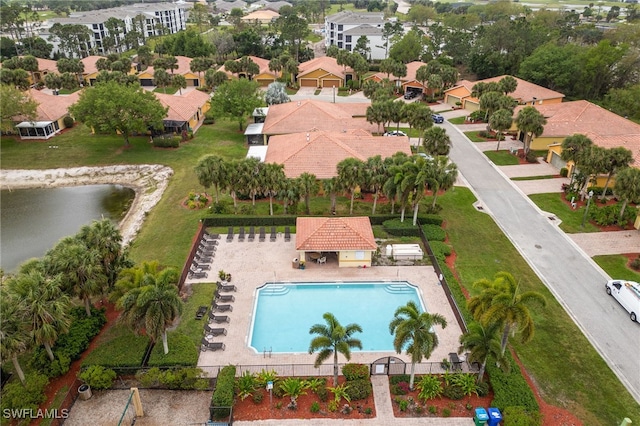 aerial view with a residential view and a water view