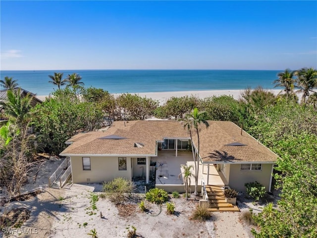 exterior space featuring a beach view