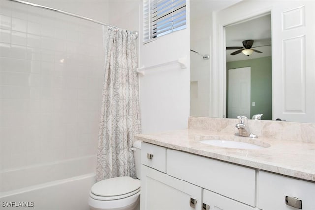 bathroom with shower / tub combo with curtain, toilet, vanity, and a ceiling fan