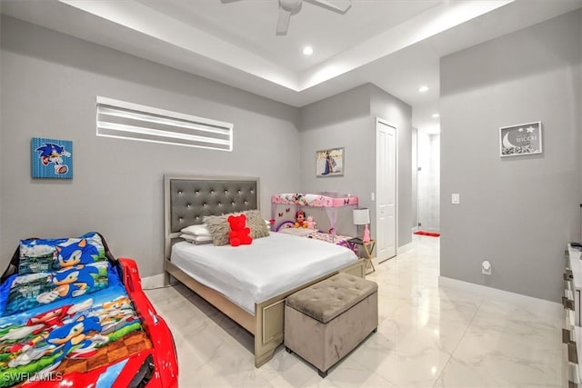 bedroom with a ceiling fan, baseboards, a tray ceiling, recessed lighting, and marble finish floor