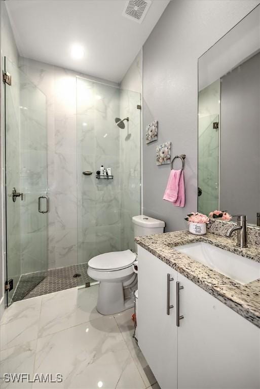 full bathroom featuring vanity, visible vents, a marble finish shower, toilet, and marble finish floor