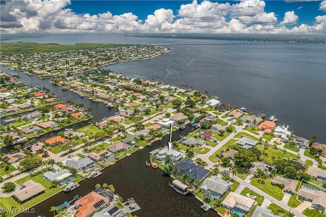 bird's eye view featuring a residential view and a water view