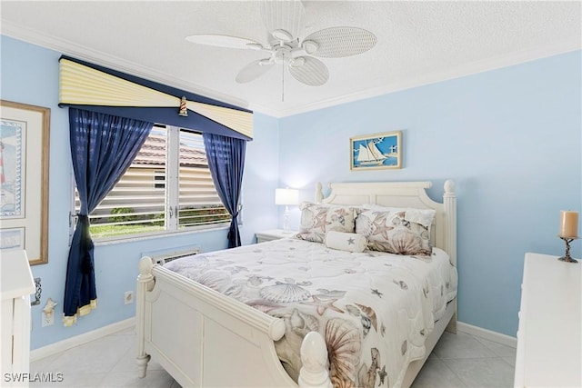 bedroom with a textured ceiling, light tile patterned flooring, baseboards, and ornamental molding