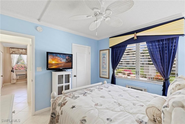 bedroom with light tile patterned floors, multiple windows, a textured ceiling, and crown molding