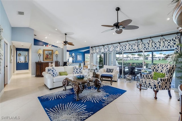 tiled living room featuring vaulted ceiling, recessed lighting, a ceiling fan, and visible vents