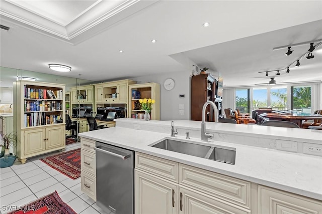 kitchen featuring light tile patterned floors, recessed lighting, a sink, dishwasher, and open floor plan