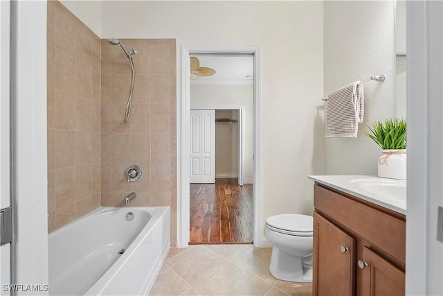 full bath with vanity, baseboards, tile patterned flooring, shower / washtub combination, and toilet