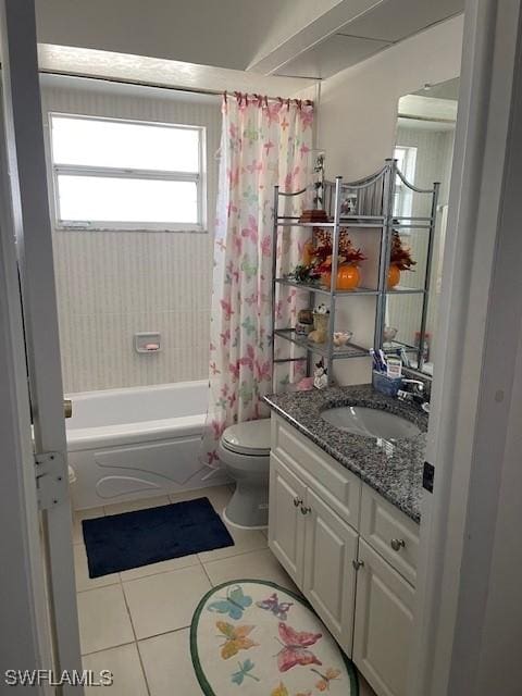 full bathroom with tile patterned floors, toilet, shower / tub combo with curtain, and vanity