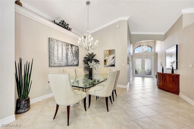 dining room featuring baseboards, ornamental molding, french doors, tile patterned floors, and a notable chandelier