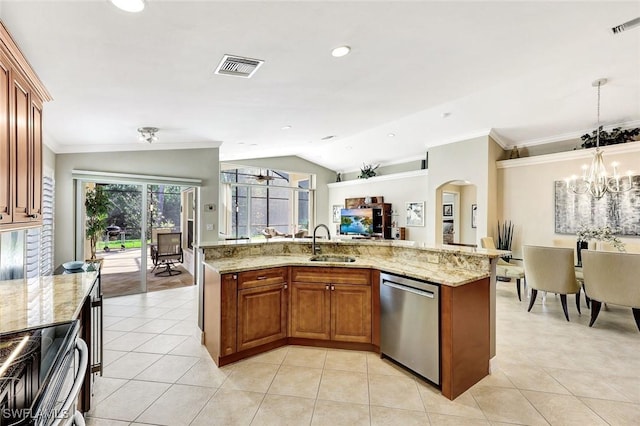 kitchen with brown cabinetry, visible vents, light tile patterned flooring, a sink, and appliances with stainless steel finishes