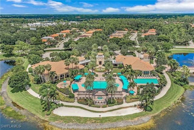 birds eye view of property featuring a water view