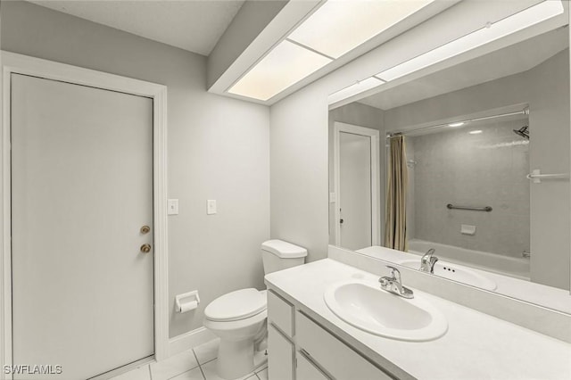 bathroom featuring vanity, baseboards, tile patterned flooring, shower / tub combo, and toilet