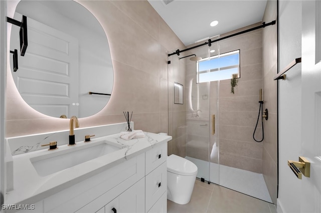 full bath with vanity, a shower stall, toilet, and tile patterned floors