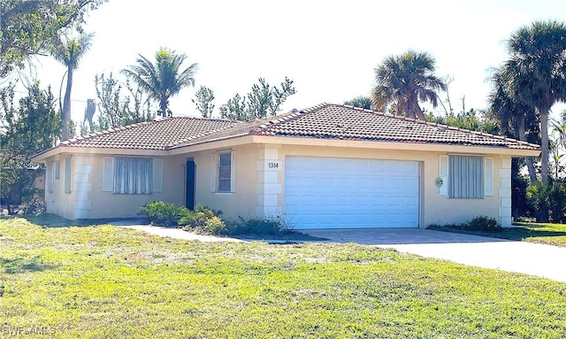 single story home with driveway, an attached garage, stucco siding, a front lawn, and a tile roof