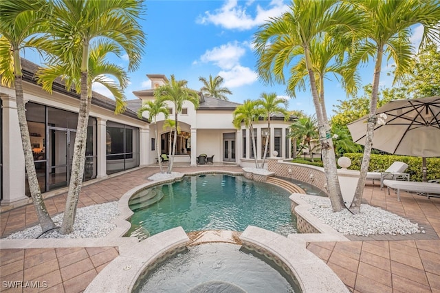 29115 W Teramo Way, Naples, FL 34110 - view of swimming pool with french doors, a patio, and a pool with connected hot tub