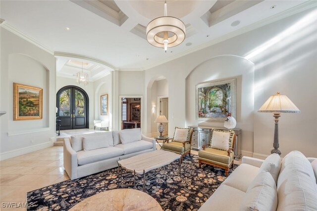29115 W Teramo Way, Naples, FL 34110 - living room featuring coffered ceiling, arched walkways, beam ceiling, light tile patterned flooring, and ornamental molding