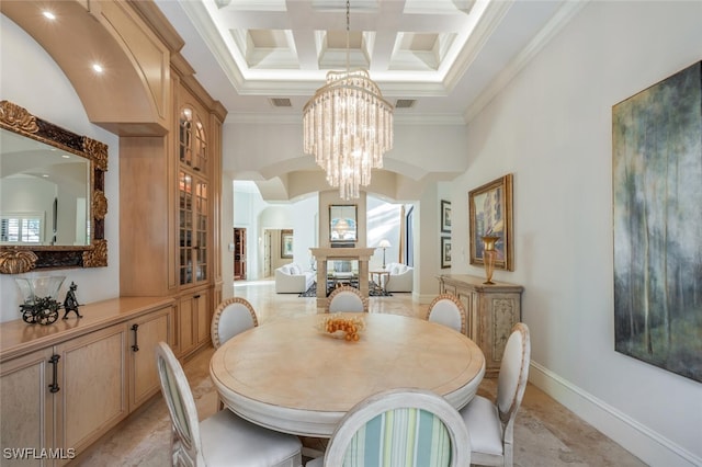 29115 W Teramo Way, Naples, FL 34110 - dining space featuring crown molding, visible vents, a chandelier, and baseboards