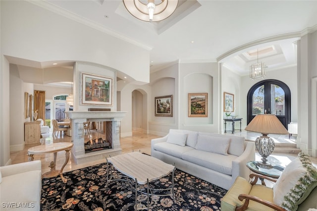 29115 W Teramo Way, Naples, FL 34110 - living area with crown molding, coffered ceiling, arched walkways, and recessed lighting