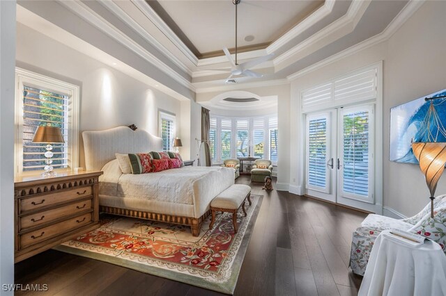 29115 W Teramo Way, Naples, FL 34110 - bedroom with crown molding, hardwood / wood-style floors, access to outside, and a tray ceiling