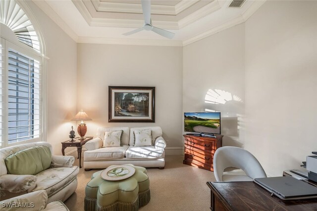 29115 W Teramo Way, Naples, FL 34110 - living area with carpet, ceiling fan, visible vents, crown molding, and a tray ceiling