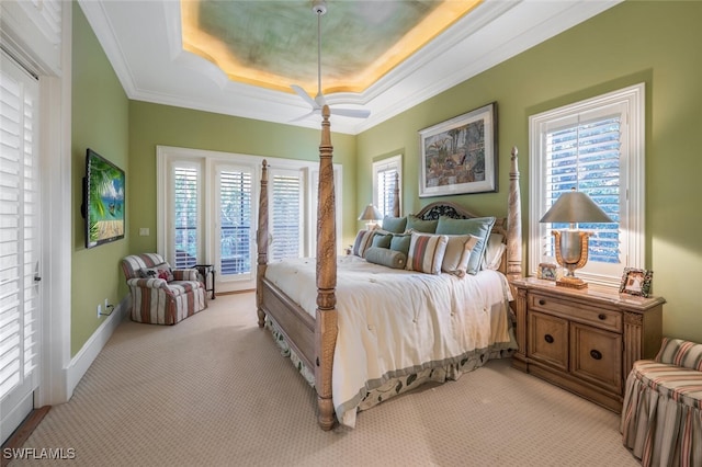 29115 W Teramo Way, Naples, FL 34110 - bedroom with ornamental molding, light colored carpet, and a tray ceiling