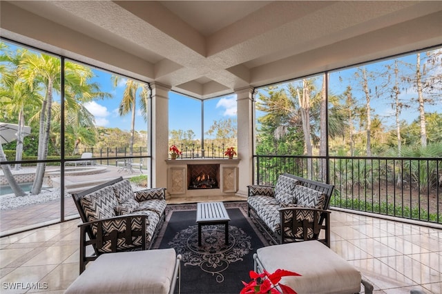 29115 W Teramo Way, Naples, FL 34110 - sunroom / solarium with a wealth of natural light and an outdoor living space with a fireplace